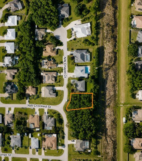 Photo of 5490 NW CHAPEL Court, Port Saint Lucie, FL 34986 (MLS # B26069060)