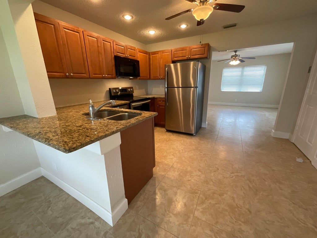 Photo of 2016 SW 16th Avenue, Boynton Beach, FL 33426 (MLS # B26041774)