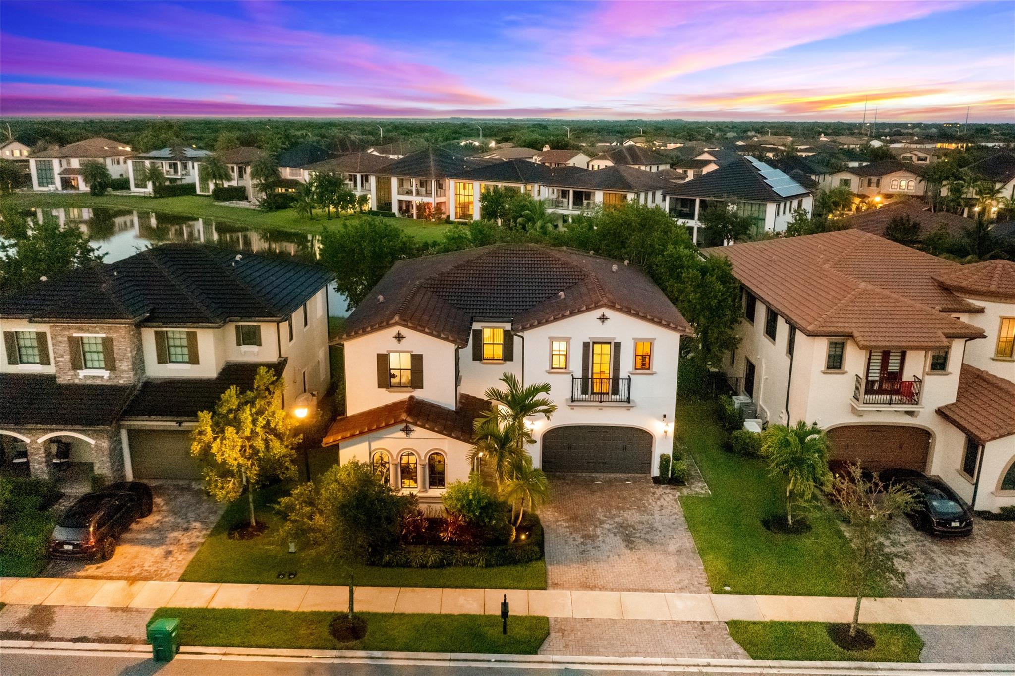Former Builder Ashby Expanded Builder Model w/Over $117K In Improvements, 5 Full Beds + Loft, 4.5 Baths Waterfront Home w/3-Car Garage! Turnkey Dream Home w/Approx 4,000 SqFt Under Living, Open Floor Plan w/Luxury Vinyl Plan Flooring Throughout 1st & 2nd Floors, Gorgeous Large Chef's Updated Kitchen w/Quartz Counters & Huge Island, Updated KitchenAid Appliances, Double Oven, Newer Light Fixtures & Pendants, Full Bed & On-Suite Bath Downstairs Ideal For In-Law's Or Guests, Primary Bed Upstairs, Walk-In Closets, Spacious Primary Bath w/Separate Tub & Shower, Dual Sinks, Another Full Bed & On-Suite Bath Upstairs, Grand Loft Area Ideal For Your Children! Expanded Pavered Patio w/Fenced In-Yard Perfect For The Entire Family, Resort-Style Clubhouse Amenities, 24-Hour Guard Gated, & A+ Schools.