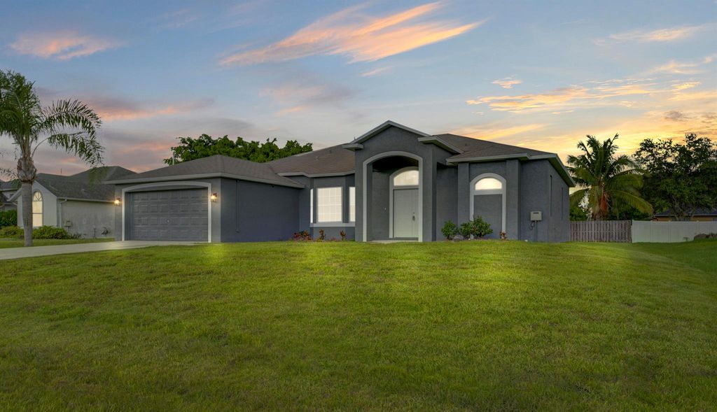 Photo of 5716 NW North Macedo Boulevard, Port St Lucie, FL 34983 (MLS # R10896700)