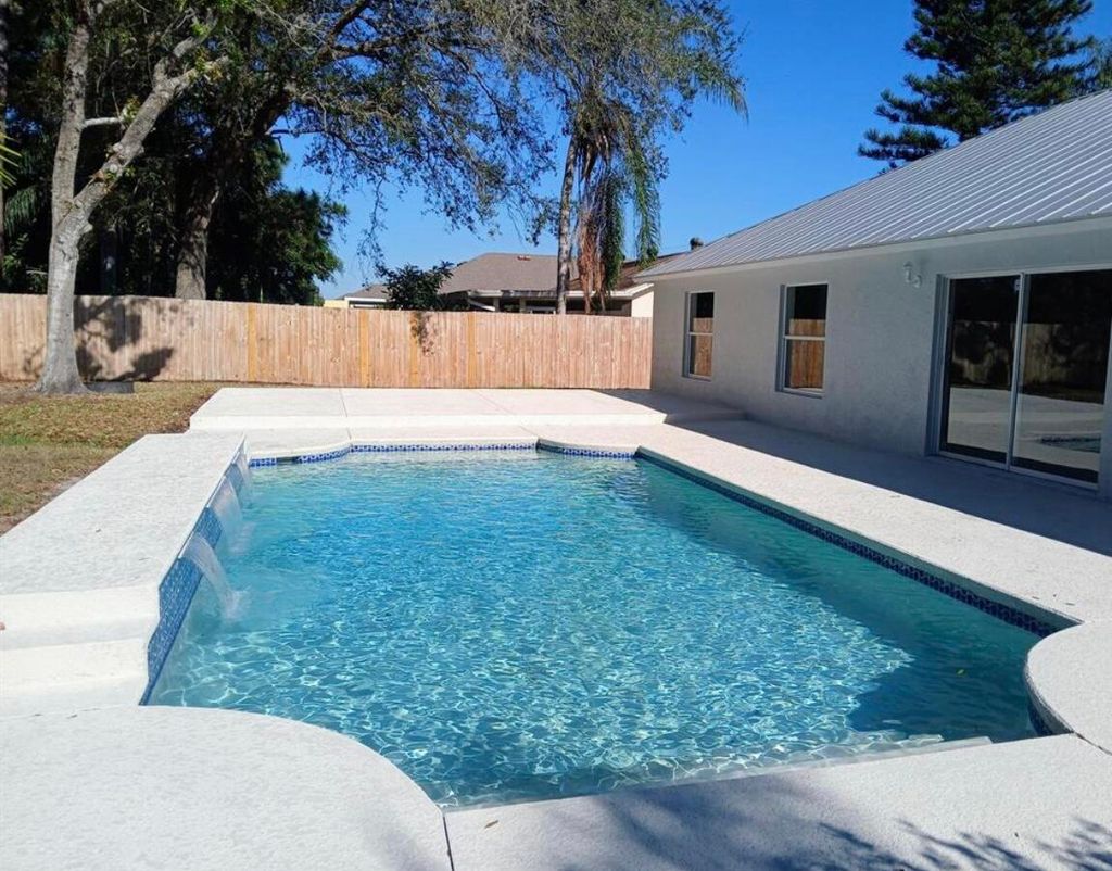 Photo of 3450 SW Martin Street, Port Saint Lucie, FL 34953 (MLS # B26005056)