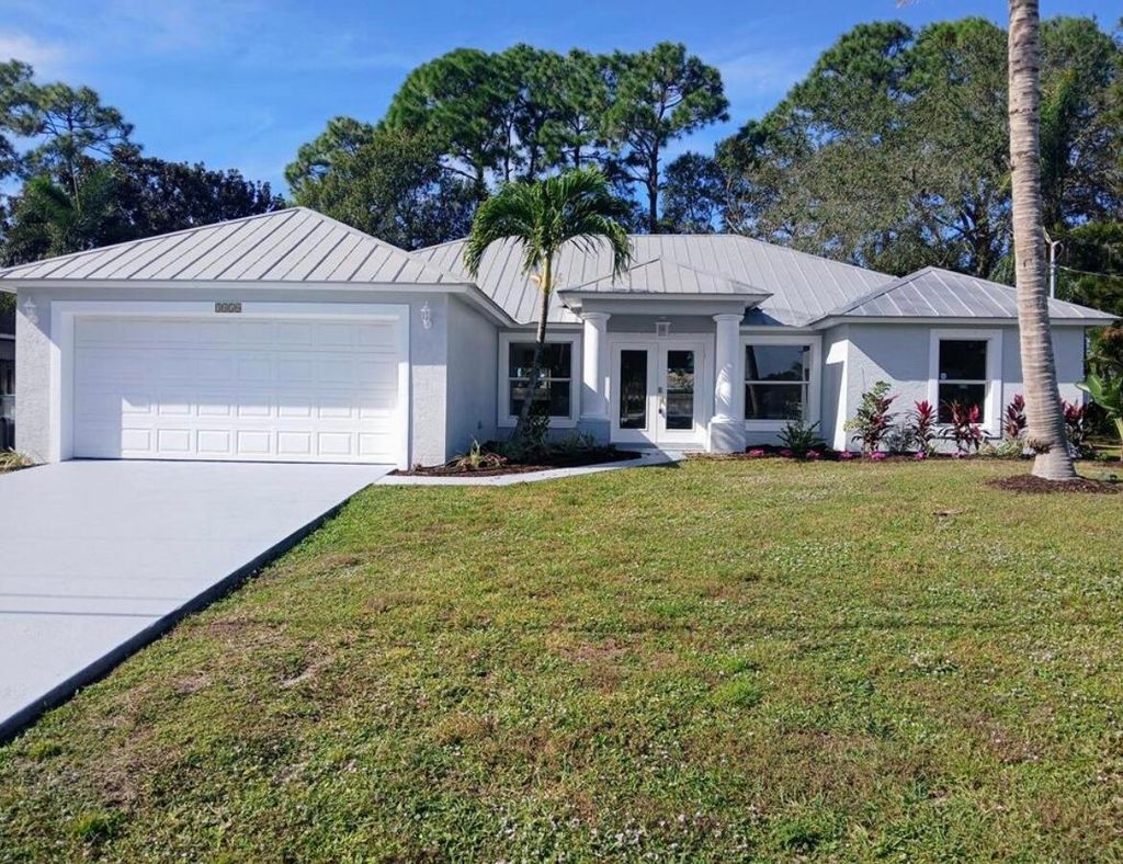 Photo of 3450 SW Martin Street, Port Saint Lucie, FL 34953 (MLS # B26005056)