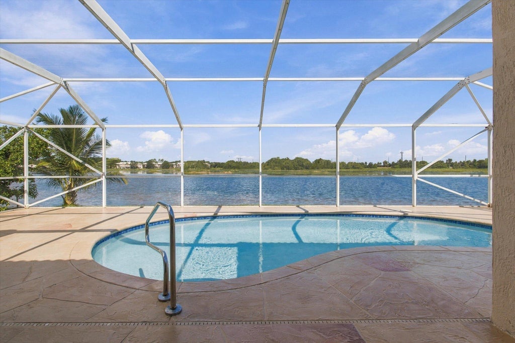 Photo of 1295 WINDSOR Lane, Weston, FL 33327 (MLS # B26080809)