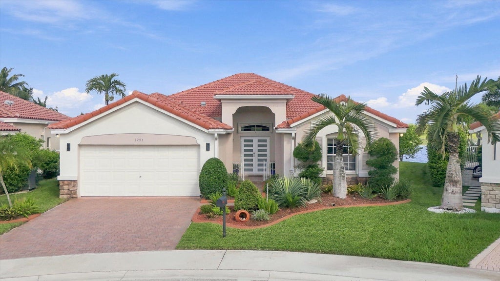 Photo of 1295 WINDSOR Lane, Weston, FL 33327 (MLS # B26080809)