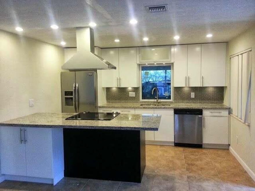 Great Single Family Home, centrally located, close to I-95 and 5 minutes away from the Beach ,Plenty space to park your boat, RV, and cards. Big fenced backyard for your pets. Enjoy the outside deck . This property is ready for you to move in.