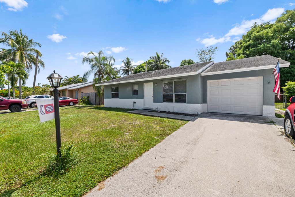 Photo of 6296 CARTHAGE Circle N, Greenacres, FL 33463 (MLS # B26067429)