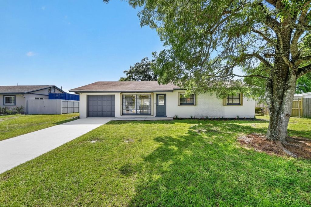 Photo of 432 W Shadyside Circle, West Palm Beach, FL 33415 (MLS # B26055992)