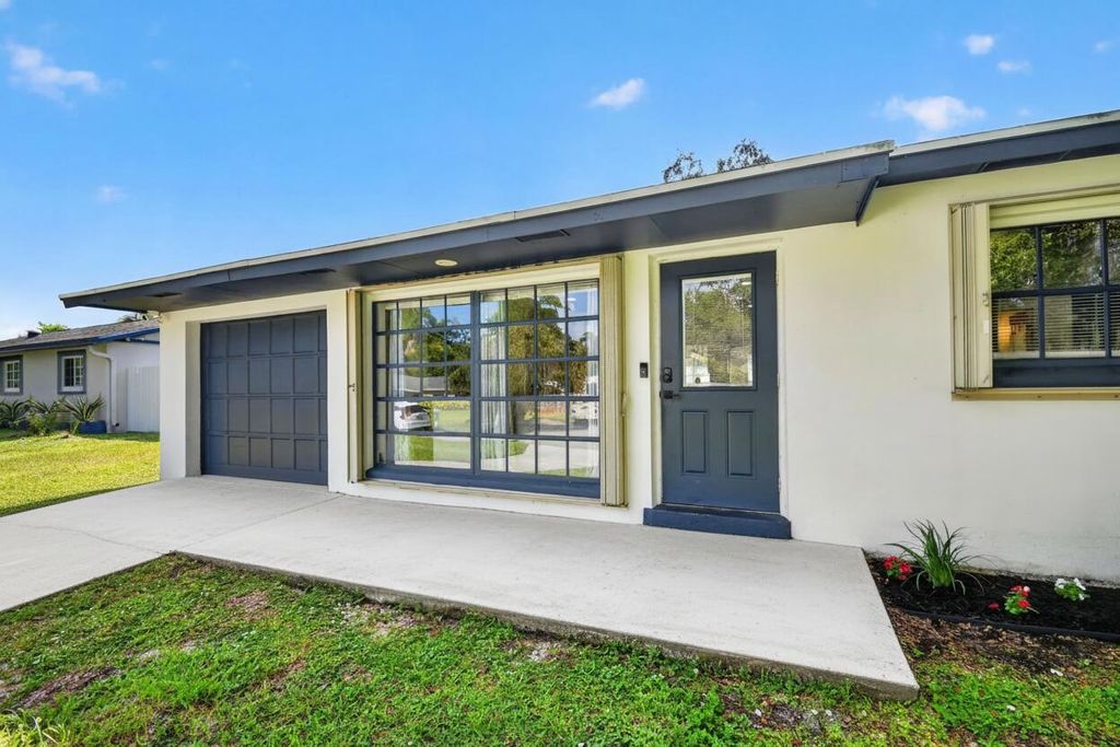 Photo of 432 W Shadyside Circle, West Palm Beach, FL 33415 (MLS # B26055992)