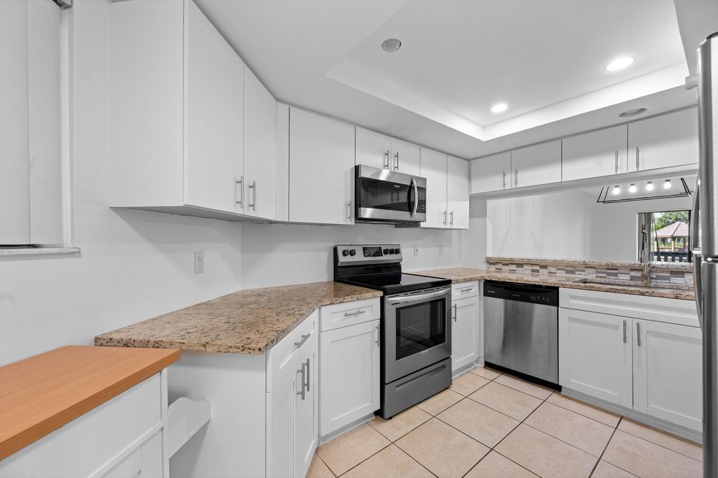 Photo of 600 Uno Lago Drive #104, Juno Beach, FL 33408 (MLS # R11145545)