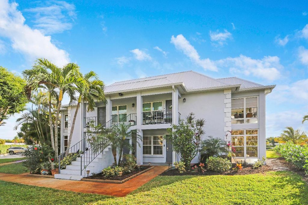 Photo of 964 NW Spruce Ridge Drive #D1, Stuart, FL 34994 (MLS # R11158999)