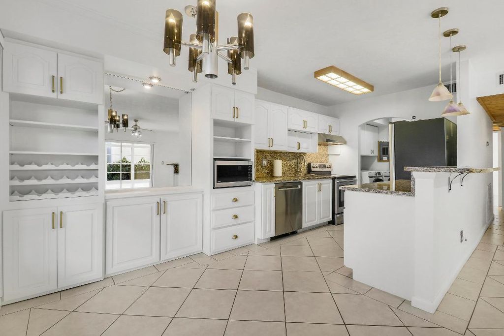 Photo of 964 NW Spruce Ridge Drive #D1, Stuart, FL 34994 (MLS # R11158999)