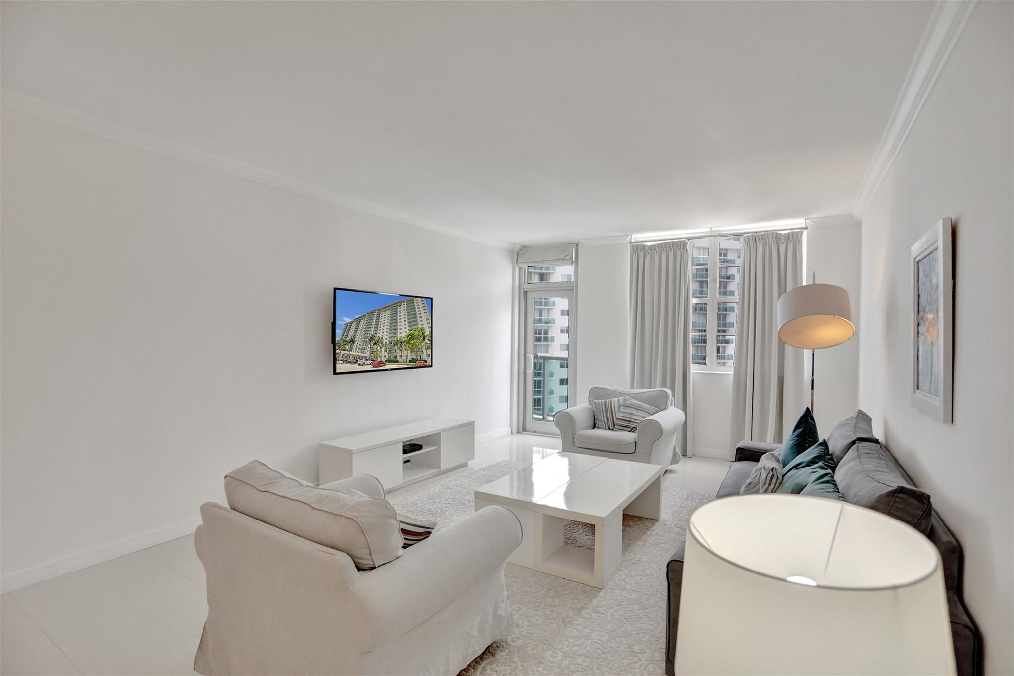Enjoy living in this beautifully updated 1-bedroom, 1-bathroom condo in the heart of Sunny Isles Beach. Fully furnished with stylish decor and high-end finishes, this unit features an open-concept layouts,and a spacious balcony offering breathtaking city views. Located in a resort-style building, enjoy top-notch amenities, including a pool, fitness center, 24-hour security, and beach access. Walking distance to shopping, dining, and entertainment. Move-in ready—just bring your suitcase!