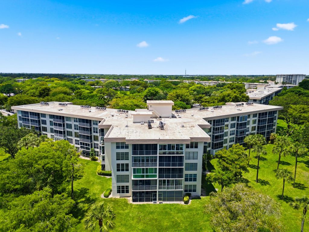 Photo of 3800 Oaks Clubhouse Drive #106, Pompano Beach, FL 33069 (MLS # B26021937)