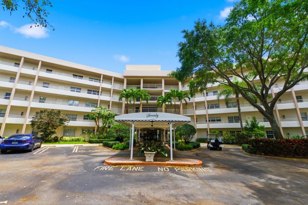 Photo of 3800 Oaks Clubhouse Drive #106, Pompano Beach, FL 33069 (MLS # B26021937)