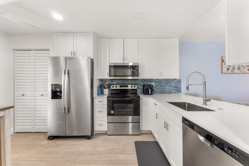 Photo of 14500 Stirling Way #403, Delray Beach, FL 33446 (MLS # B26011925)