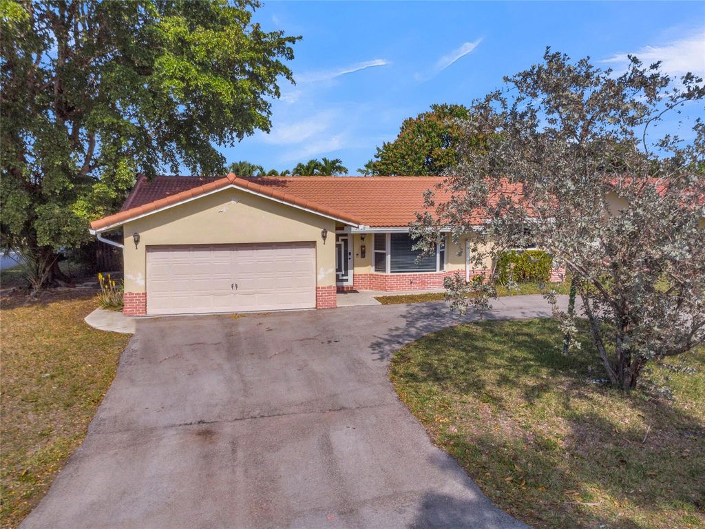 Photo of 3780 NW 78th Terrace, Coral Springs, FL 33065 (MLS # F10490981)