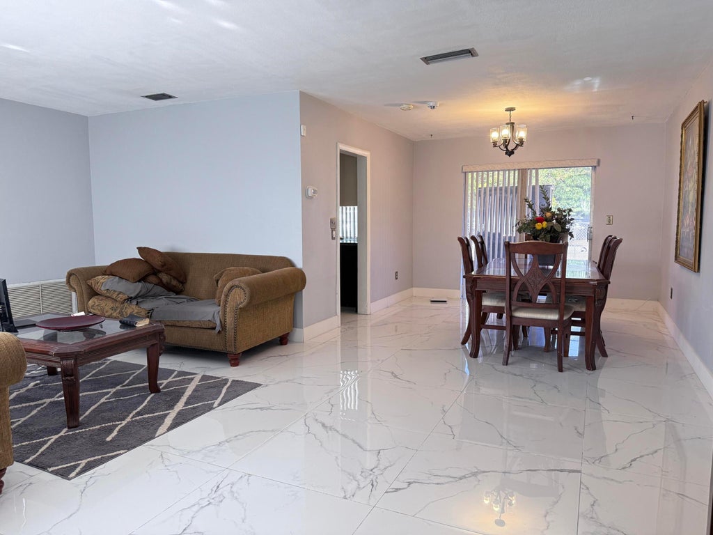 Photo of 7201 MCKINLEY Street, Hollywood, FL 33024 (MLS # B26066601)