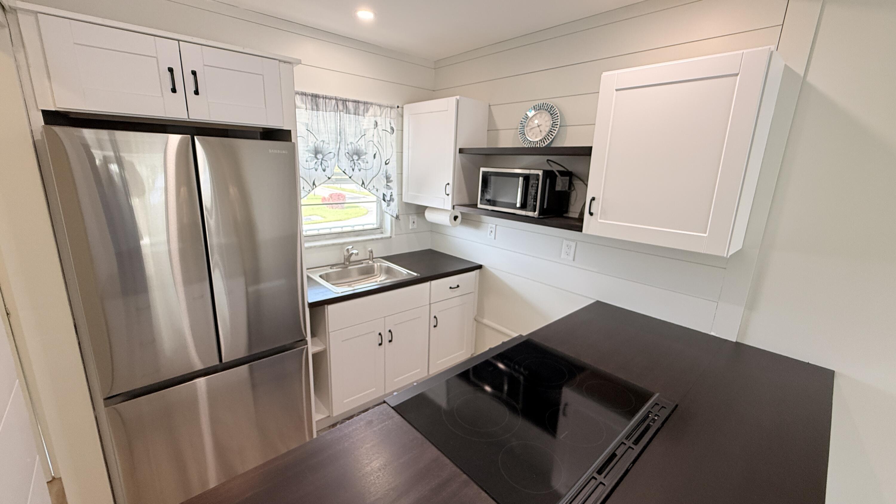 LEISUREVILLE LAKE CONDO - Residential