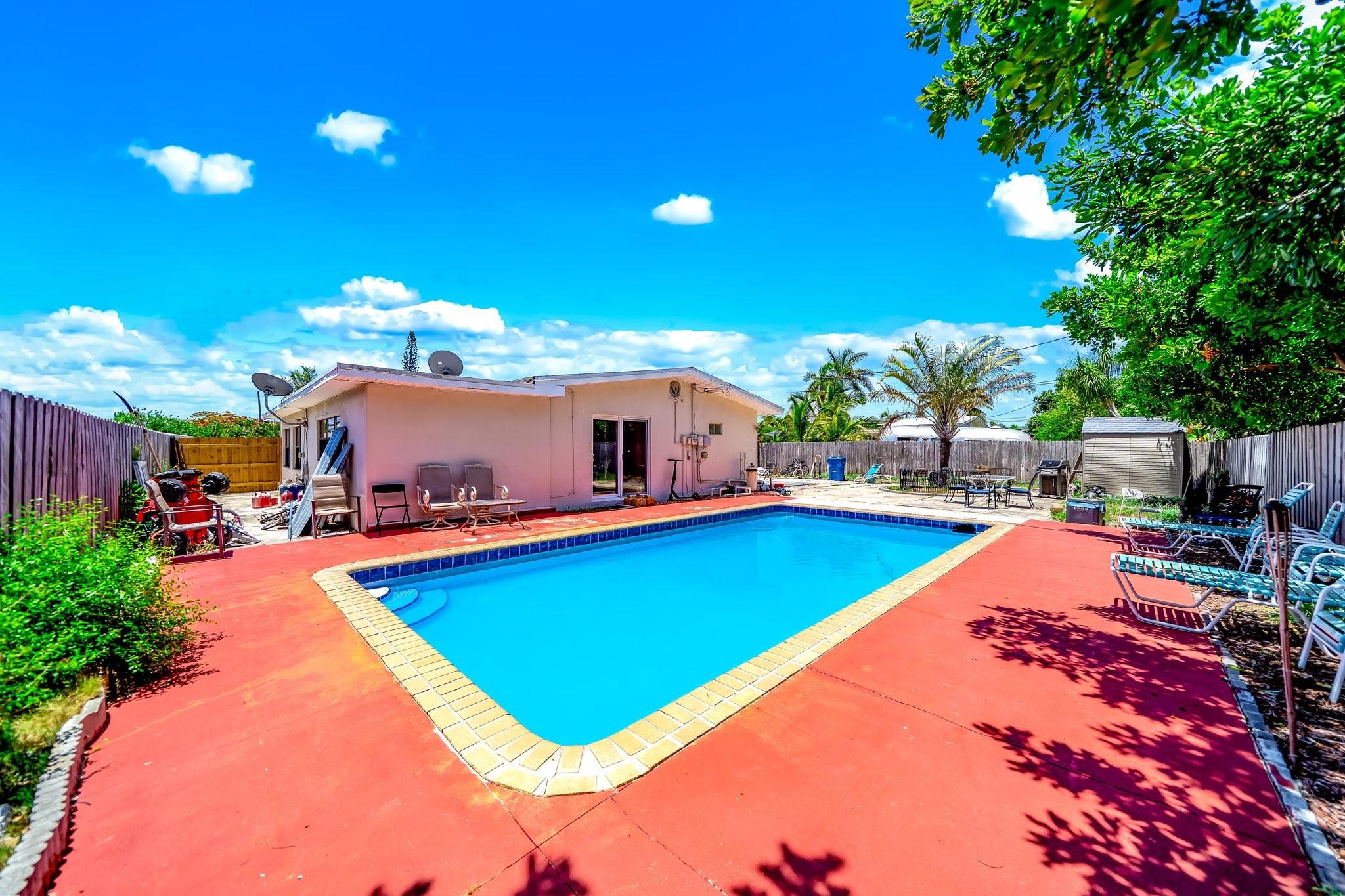 Welcome to this 3 Bedroom, 2 Bathroom, Single Family Pool beachside Home!! Located less than 2 miles from the ocean and just under 1 mile from I-95. This spacious 3-bedroom home is nestled in the NON-HOA community of Lantana Heights by the Intracoastal. Set on over 1/5 of an acre, it offers nearly 1,400 sq ft of living space and a backyard featuring your very own private POOL. In addition to its unbeatable coastal location, this home is walking distance to local schools and parks perfect for families or anyone who enjoys an active, outdoor lifestyle. Whether you're a first-time buyer or an investor, this property checks all the boxes. Don’t miss your chance to own a slice of paradise! Schedule your private tour today!