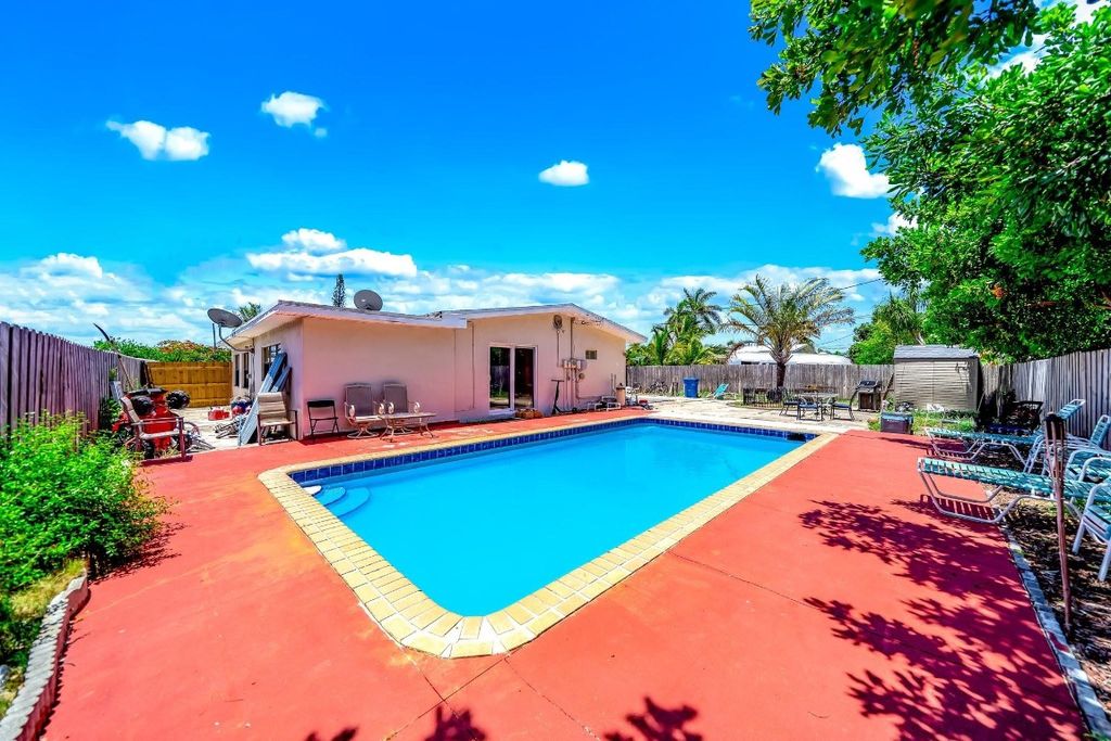 Photo of 907 W Bloxham Street, Lantana, FL 33462 (MLS # F10509447)