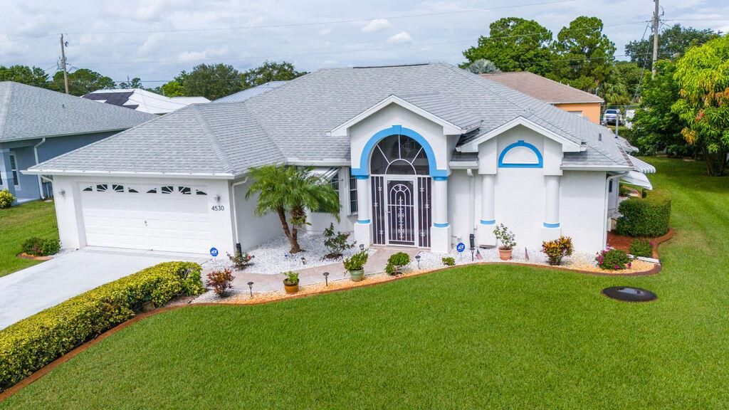 Photo of 4530 SW Darwin Boulevard, Port St Lucie, FL 34953 (MLS # R10908472)