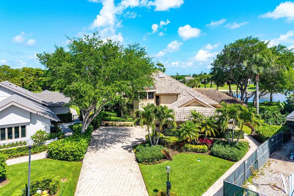 Photo of 3566 Loire Lane, Palm Beach Gardens, FL 33410 (MLS # B26016702)