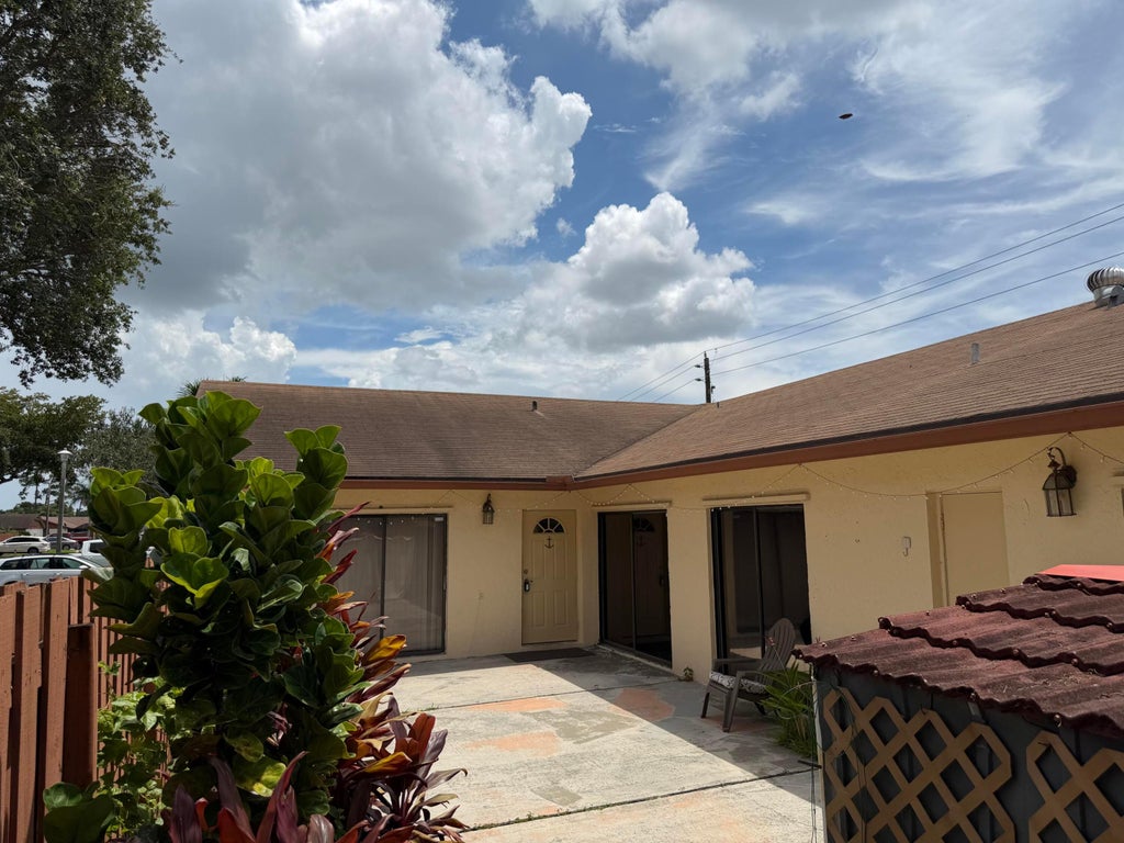 Photo of 1051 Summit Place Circle #D, West Palm Beach, FL 33415 (MLS # B26047349)