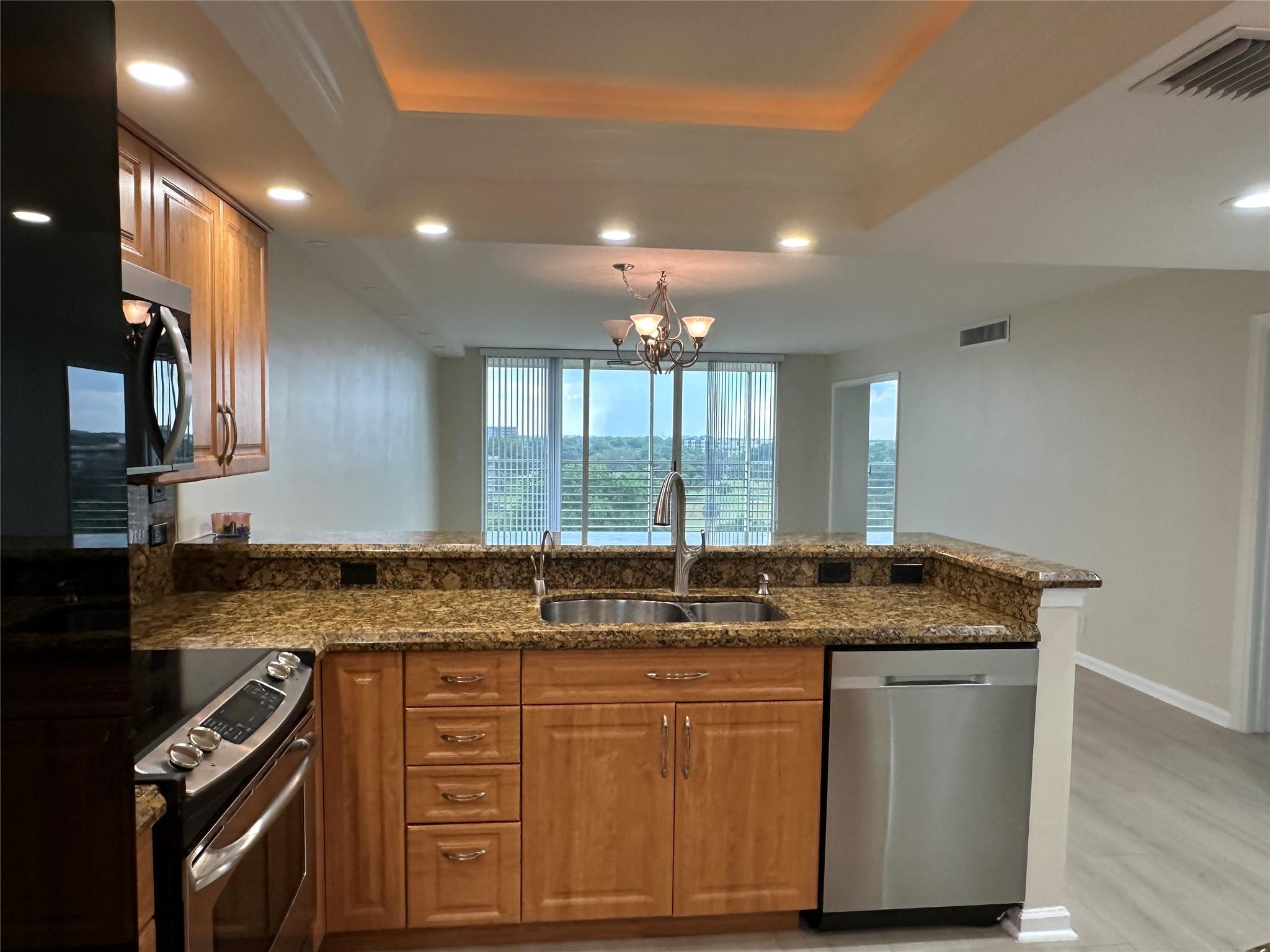BEAUTIFUL VIEW ON THIS GREAT CORNER UNIT FOR RENT! 3 BEDROOMS 2 BATHS, ALL RECENTLY REMODELED WITH BRAND NEW FLOORING AND APPLIANCES, OPEN AND SPACIOUS KITCHEN WITH GRANITE COUNTERTOPS, NEW LIGHTING, NEW BATHROOMS, THIS 1500 SQ UNIT OFFERS AN OPEN FLOOR PLAN AND A GORGEOUS VIEW OF THE GOLF COURSE AND LAKE FROM THE OVERSIZE BALCONY; NEW WASHER AND DRYER IN THE UNIT, IMPACT WINDOWS. VERY CLOSE TO THE POOL AREA AND NEW GAZEBOS, COME AND ENJOY ALL WHAT PALM AIRE HAS TO OFFER.