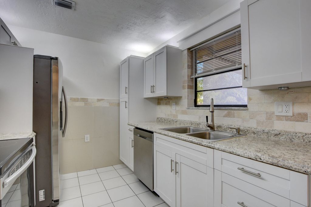 Photo of 12449 Westhampton Circle, Wellington, FL 33414 (MLS # R11160829)