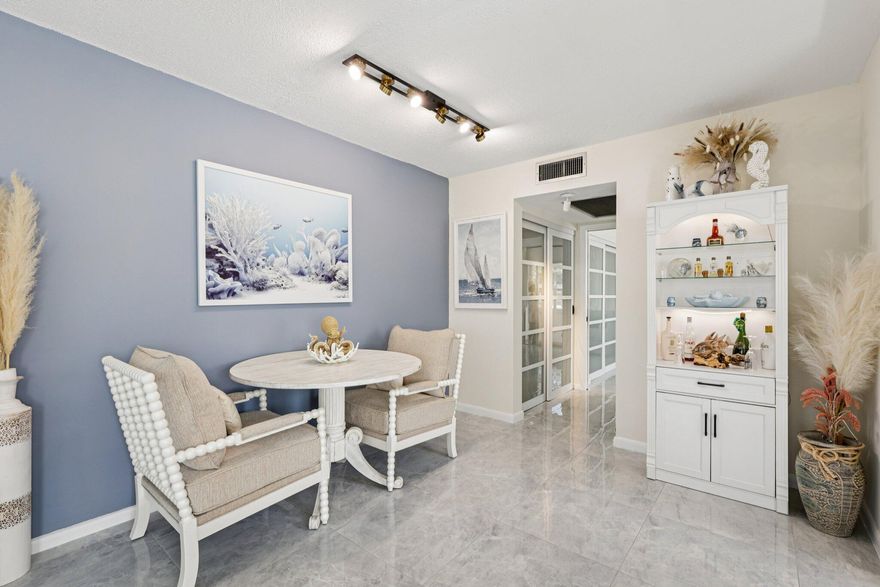 Rent immediately and offered fully furnished—an excellent opportunity for Deerfield Beach investors, snowbirds, or seasonal buyers seeking a move-in-ready condo. This updated 1BR/1.5BA first-floor corner unit in a desirable 55+ community features light-filled living spaces, tile flooring throughout, new light fixtures, custom closet organizers, and updated doors for added comfort and accessibility. Enjoy a screened patio perfect for indoor-outdoor Florida living and other everyday conveniences. Located in a quiet, well-maintained community with clubhouse, pools, fitness center, and social activities. Just minutes to Deerfield Beach, shopping, dining, and major highways—ideal as a primary home, vacation getaway, or investment property.