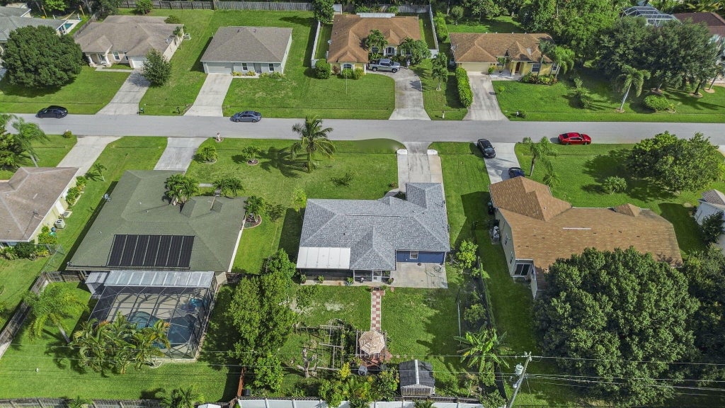 Photo of 1342 SW Wampler Avenue, Port Saint Lucie, FL 34953 (MLS # R11011721)