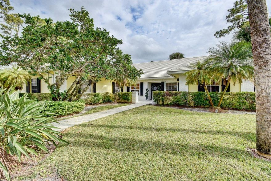 You'll fall in love with the neighborhood before you even get to the house. Set on a little over an acre, this 4 bedroom, 2 and a half bath house is ready for you and your family to move in. You'll be welcomed home to a bright and airy living room with vaulted ceilings and a beautiful view out to your screened lanai -  complete with plenty of entertaining space, a large pool and summer kitchen. The freshly remodeled eat-in kitchen has a walk-in pantry and is open the family room. The secluded master has an entry room with a wet bar that you could use as a den, sitting room, nursery - you name it. Keeping with the spacious functionality of the rest of the home, the 3-car garage provides ample room for parking and storage. Last but not least, don't miss the big back yard and its fruit trees!