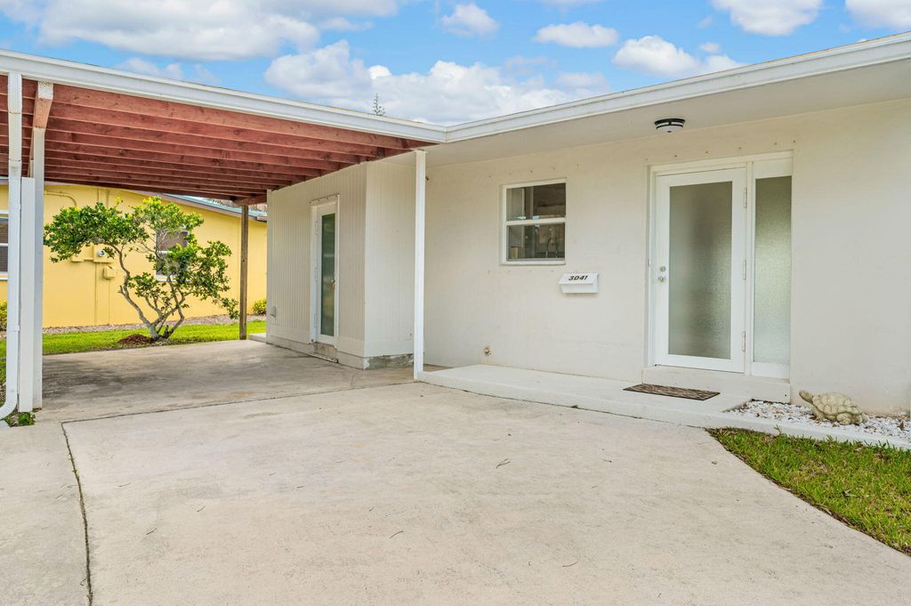 Photo of 3041 SE Morningside Boulevard, Port Saint Lucie, FL 34952 (MLS # B26019367)