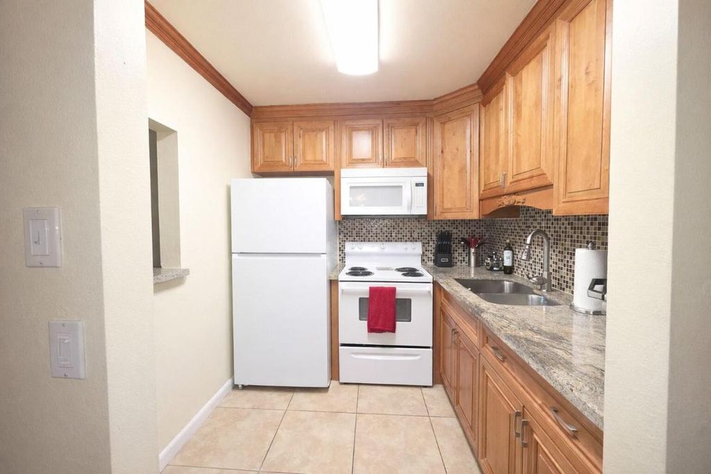 Photo of 204 Kent L Ter #L, West Palm Beach, FL 33417 (MLS # R11155192)