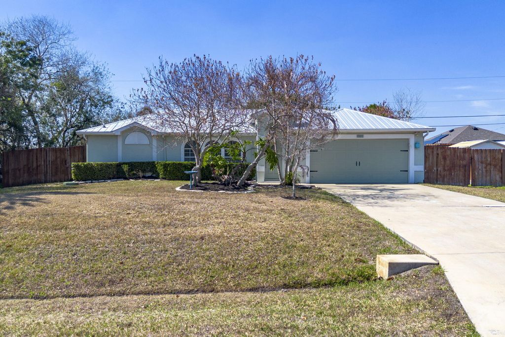 Photo of 1966 SW Guernsey Street, Port Saint Lucie, FL 34987 (MLS # R11167276)