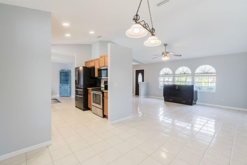 Photo of 1966 SW Guernsey Street, Port Saint Lucie, FL 34987 (MLS # R11167276)