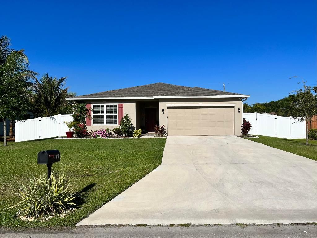 Photo of 1973 SW Libra Lane, Port Saint Lucie, FL 34983 (MLS # R11154927)