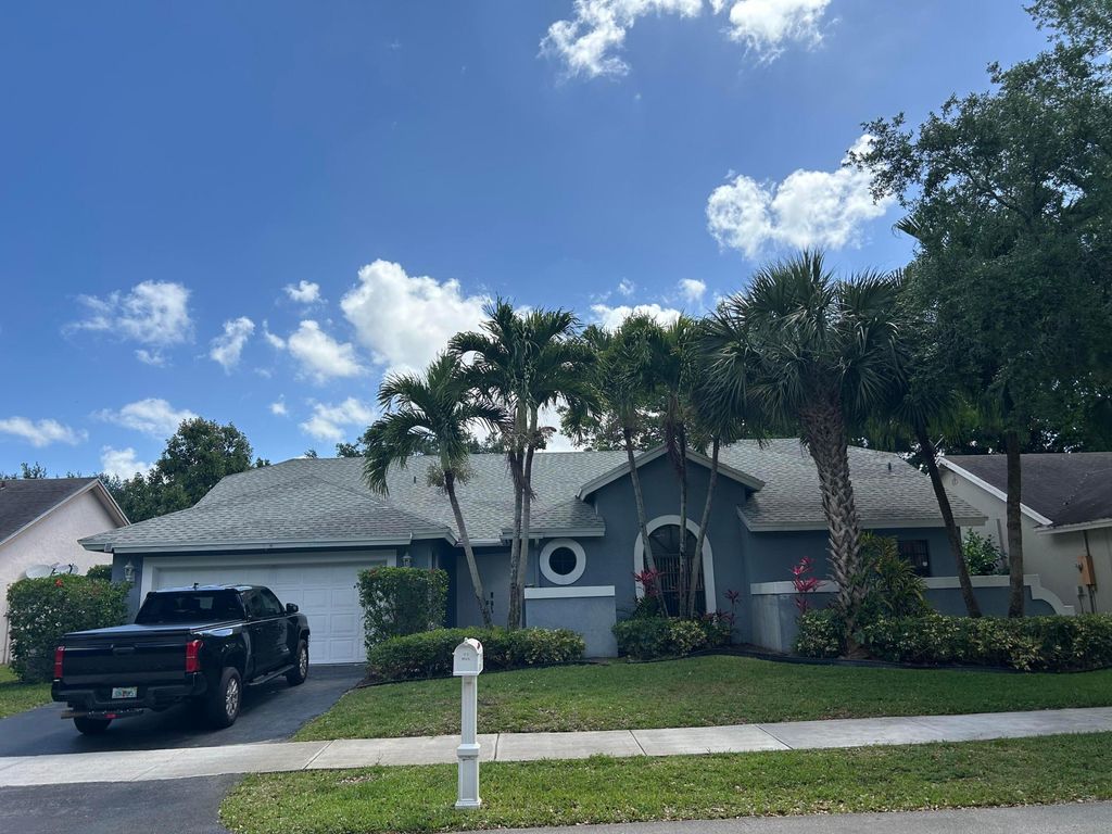 Photo of 5124 NW 42nd Terrace, Coconut Creek, FL 33073 (MLS # B26013732)