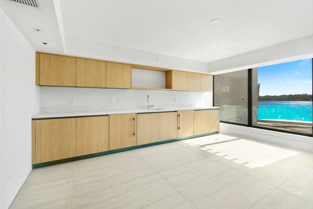 Photo of 12450 SE Crystal Cove Place #8, Jupiter, FL 33469 (MLS # B26082968)