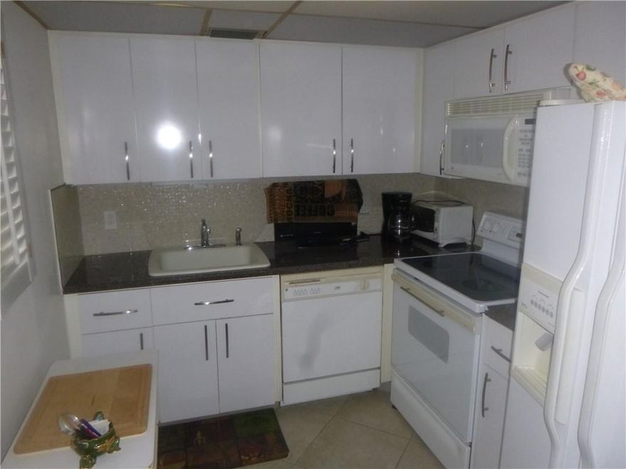 2BR/2BA 2nd floor condo in the Brittany section of Kings Point, Delray's premier 55+ community. tiled throughout, partially updated kitchen and enclosed balcony with washer/dryer. Community amenities include the newly renovated state of the art Main Clubhouse, fitness center, tennis, swimming pools indoor and out. Enjoy live shows and movies. Hundreds of workshops and clubs. Onsite dining. Courtesy buses. Close to downtown restaurants, shopping and beaches. Come check out the best in 55+ living today!!