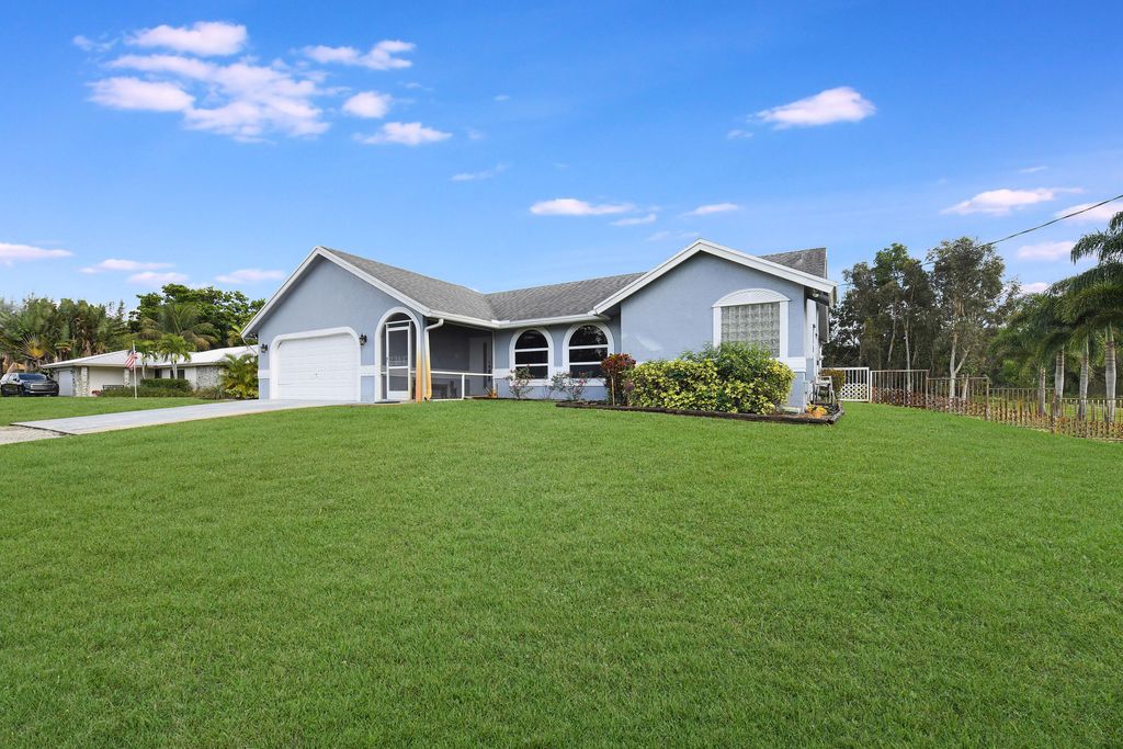 Photo of 6846 Royal Palm Beach Boulevard, The Acreage, FL 33412 (MLS # R10952418)