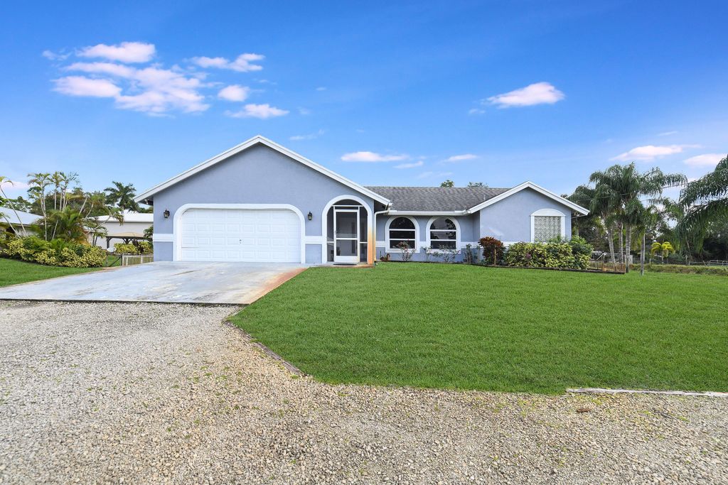 Photo of 6846 Royal Palm Beach Boulevard, The Acreage, FL 33412 (MLS # R10952418)