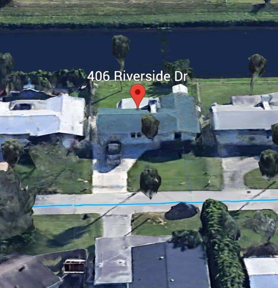 Photo of 406 Riverside Drive, Palm Beach Gardens, FL 33410 (MLS # R10983819)