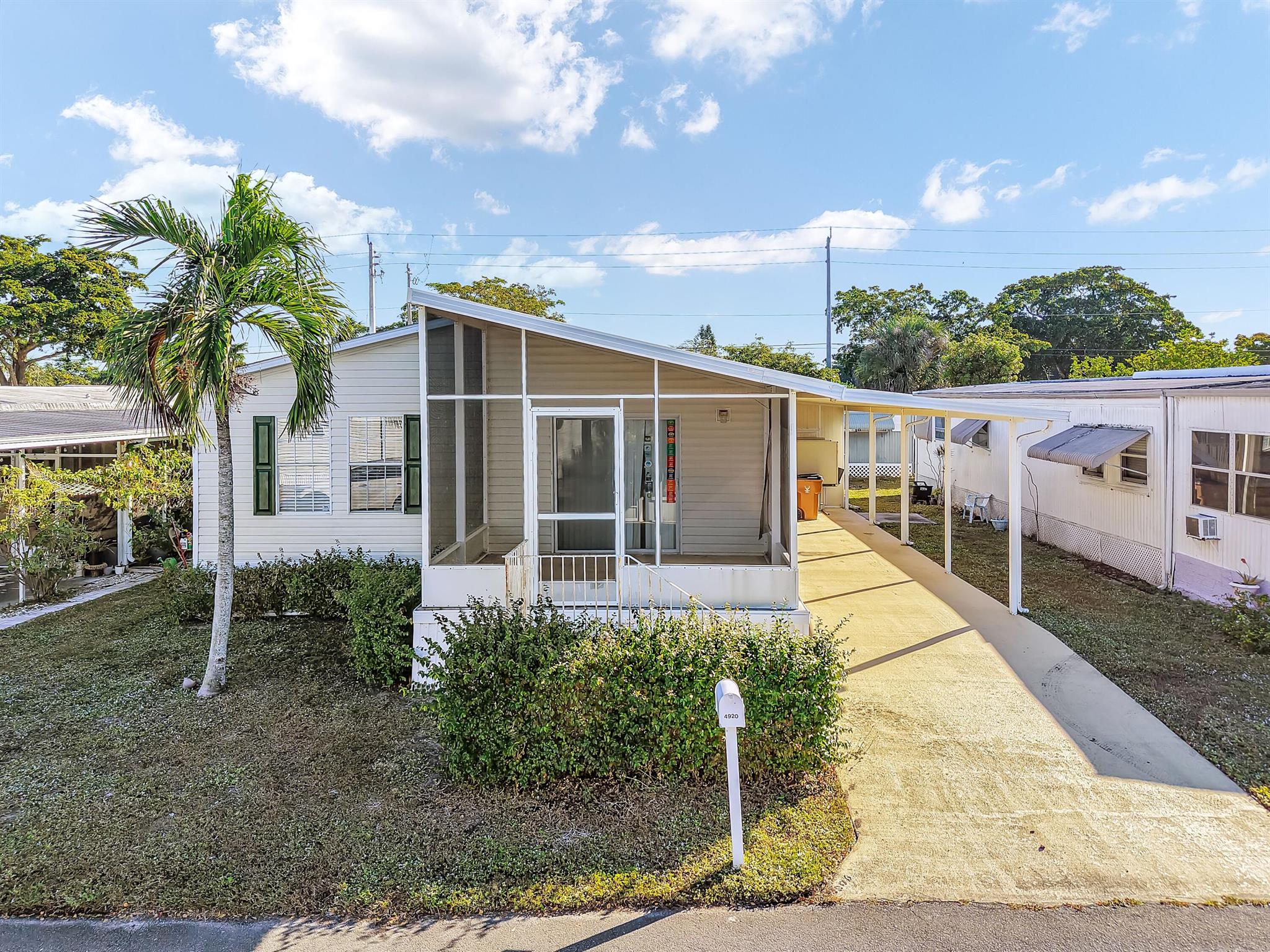 PRICE REDUCED!!! DON'T MISS THE OPPORTUNITY TO VIEW THIS BEAUTIFUL AND SPACIOUS 2 BEDROOMS, 2 BATHS WITH A POSSIBILITY FOR A 3RD BEDROOM AND ENCLOSED FLORIDA ROOM WITH A SEPARATE ENTRANCE. THIS HOME HAS LOTS OF POTENTIAL JUST WAITING FOR YOUR PERSONAL TOUCH. COUNTRY KNOLLS IS A 55+ COMMUNITY CLOSE TO THE DESIRABLE BEACH OF DEERFIELD. THE WORRY-FREE SOUTH FLORIDA LIFESTYLE, WITH AMENITIES GALORE. PERFECT FOR RETIREES. LOT RENTAL $1066 INCLUDING WATER, SEWER, TAXES AND ALL AMENITIES.