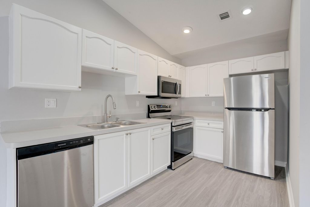 Photo of 9244 Roan Lane #Unit B, West Palm Beach, FL 33403 (MLS # B26046386)