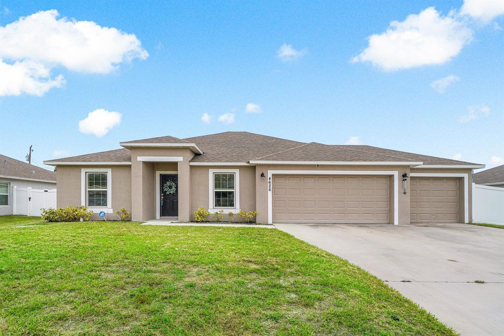 Photo of 4626 SW Pearl Street, Port Saint Lucie, FL 34953 (MLS # R11004307)