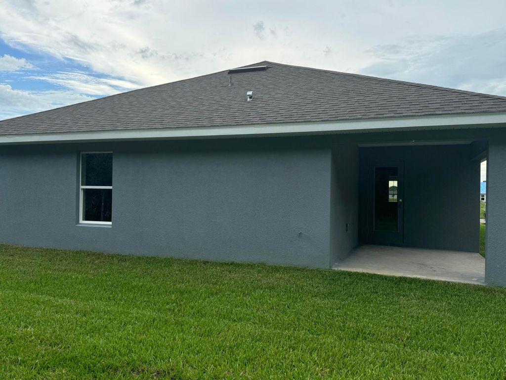 Photo of 5483 Lugo Street, Fort Pierce, FL 34951 (MLS # R11014472)