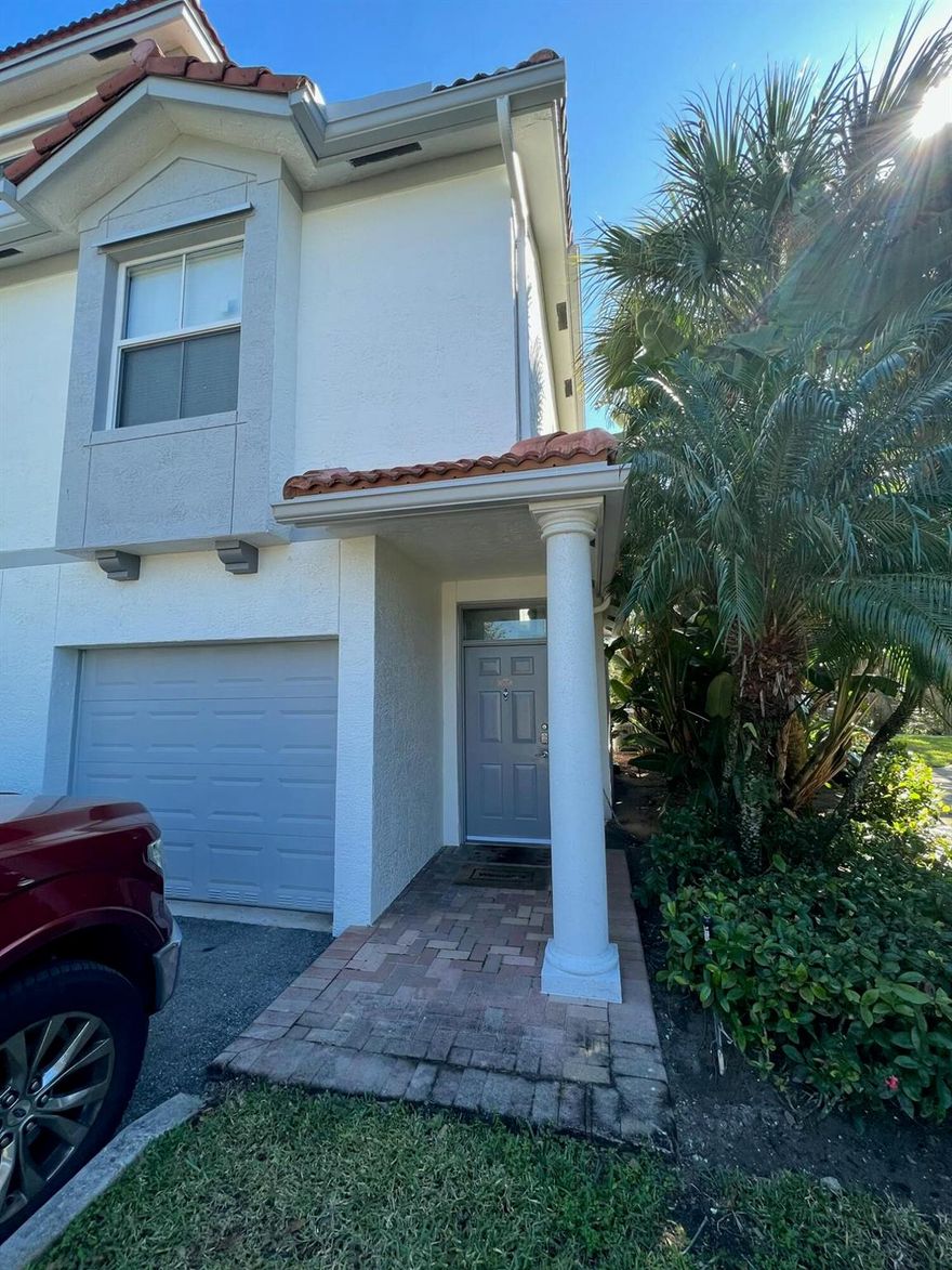 FULLY FURNISHED beautifully updated 3/2 end unit townhome w/ 1 car garage & exceptional Delray Beach location. 1st floor entry foyer w/ interior access to garage. 2nd floor has open kitchen w/ rear private balcony overlooking lake, living/dining room as well as guest bedroom, full bath, laundry & storage closet. 3rd floor houses private owner's suite with ensuite bath & large walk-in closet. Impact glass for peace of mind. Community pool, gym, tennis, basketball & tot lot. Convenient access to I-95, beach & shopping. No pets preferred but will consider <20lbs. First, last & security required w/ online application.