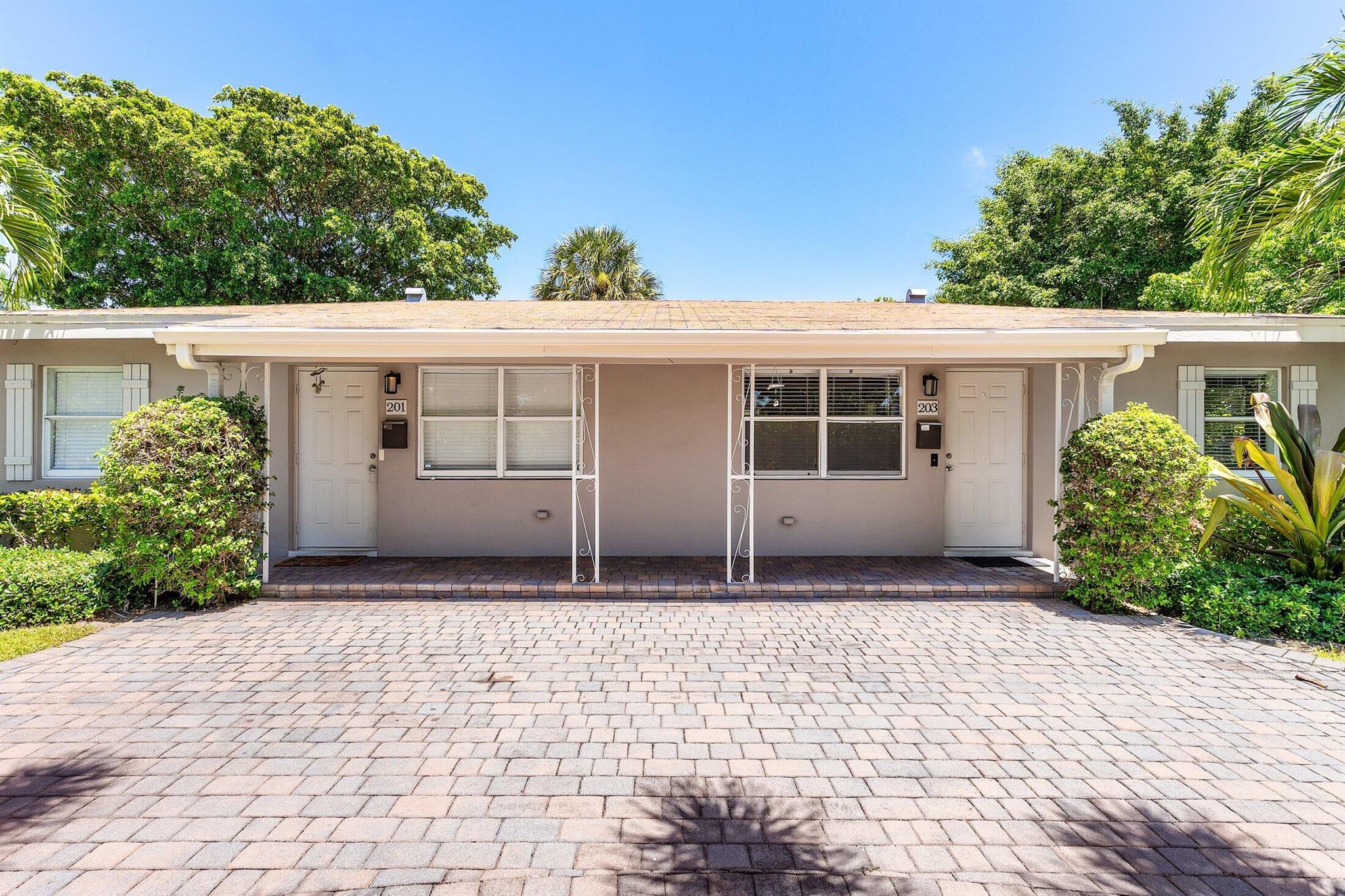 Available Immediately!!!! Beautifully renovated east side of a duplex located in one of East Delray's most sought-after neighborhoods--just minutes from vibrant Atlantic Avenue, pristine beaches, top-rated restaurants, boutique shopping, and major highways. This spacious 2-bedroom, 1-bathroom residence sits on a prominent corner lot and features a large paver circular driveway with additional parking .