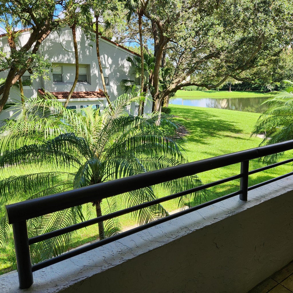 Photo of 851 Lyons Road #22203, Coconut Creek, FL 33063 (MLS # B26071124)